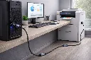 Modern office workspace with tech setup.webp