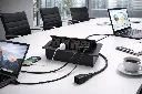 Modern conference room with power sockets.webp