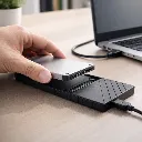 Inserting SSD into external enclosure.webp